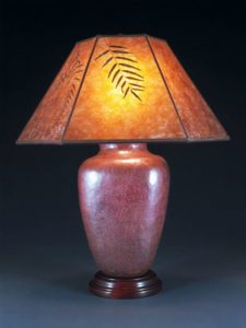 t103 Hammered Mexican copper lamp base with amber mica lamp shade