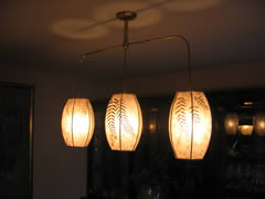 Mica hanging lamps grace the dining room