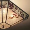 C326 diagonal detail - Cut-corner square silver mica ceiling light with aqua color band and natural foliage